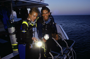 Night divers getting ready to Jump - Picture property of PADI - Snippy's Snaps Diving - Dive Snippy